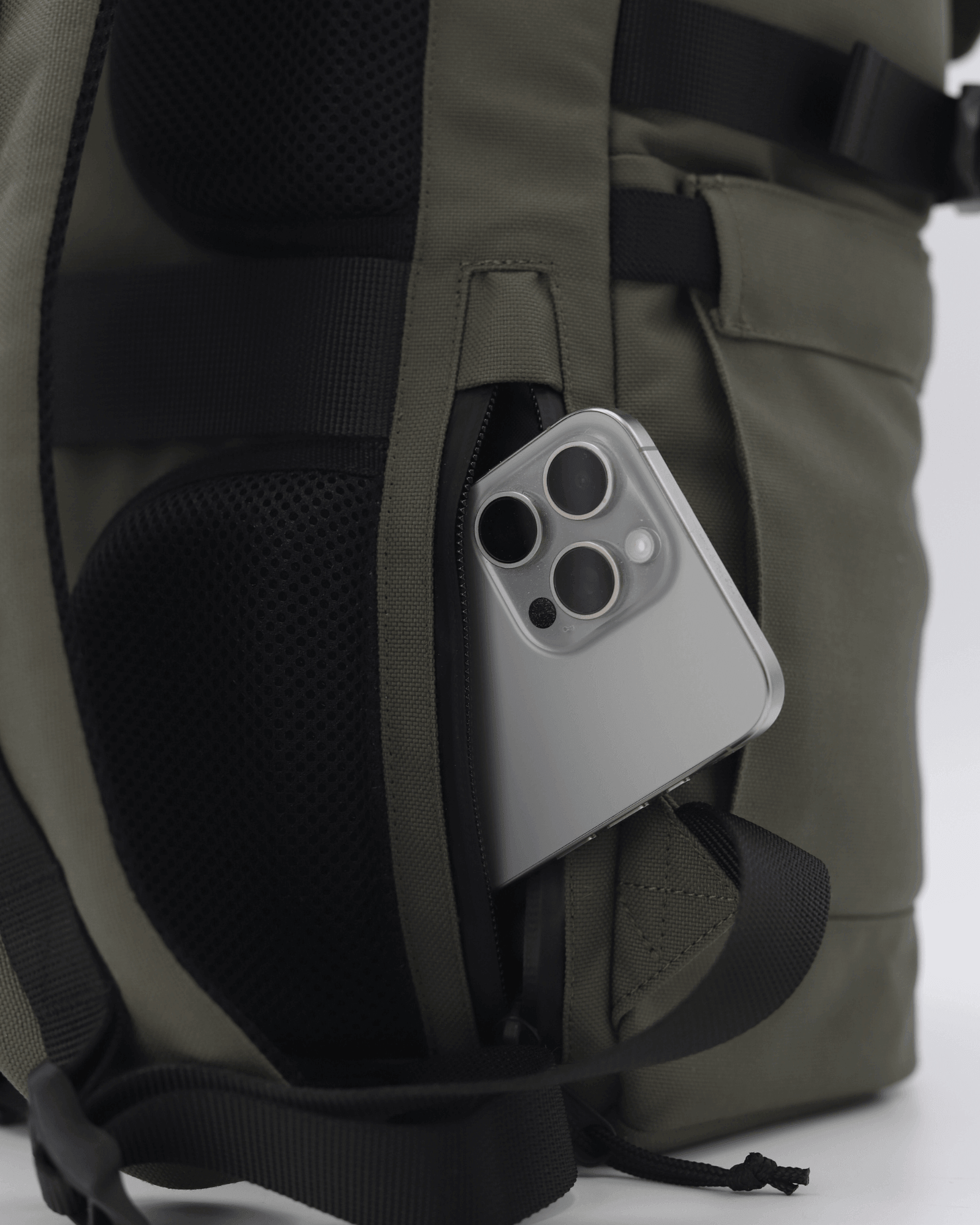 Minato Premium 6.0 – Ranger Green bag with smartphone in side pocket, showcasing its functional design and durable material.