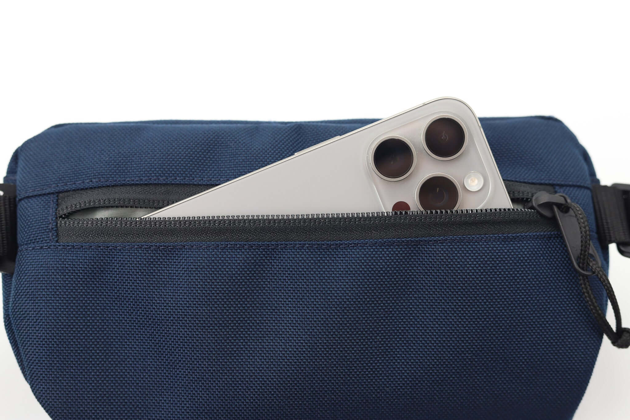 Sora 2.0 - Navy Blue fanny pack with smartphone in zippered pocket